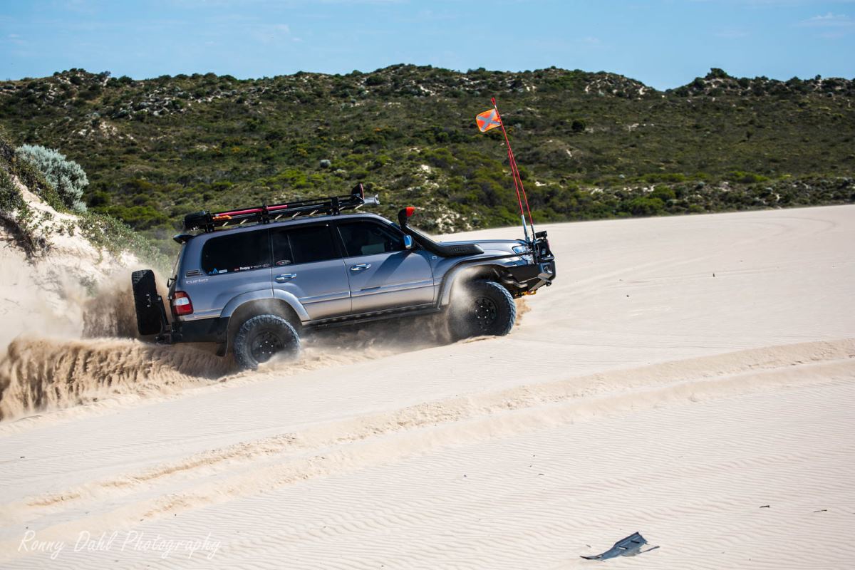Toyota Land Cruiser 100 Series in the sand dunes.