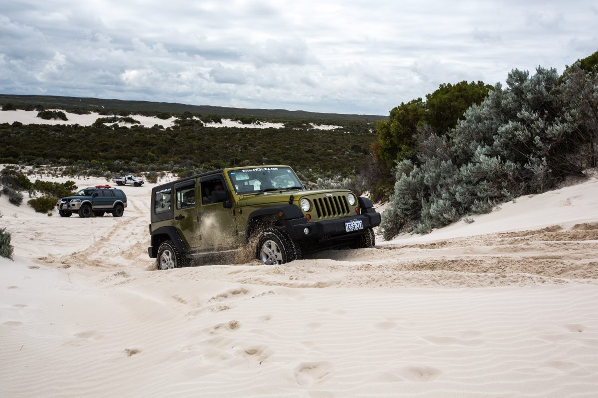 Stuck in sand 4 wheel driving.