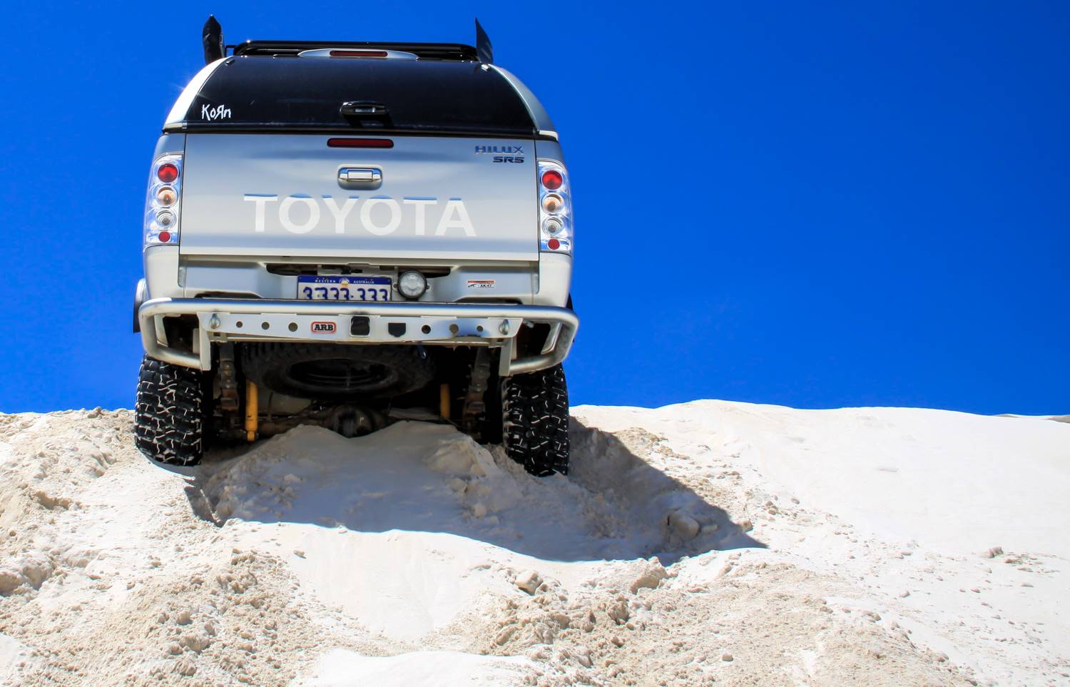 Toyota Hilux stuck on a razor back dune.