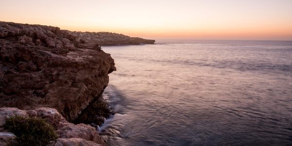 Sunset at False Entrance rock cliff fishing. Sunset at False Entrance rock cliff fishing.