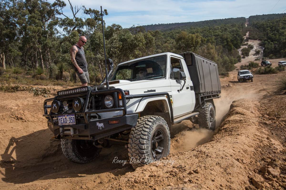 Toyota 79 series Land Cruiser on the Mundaring power line track. Western Australia.