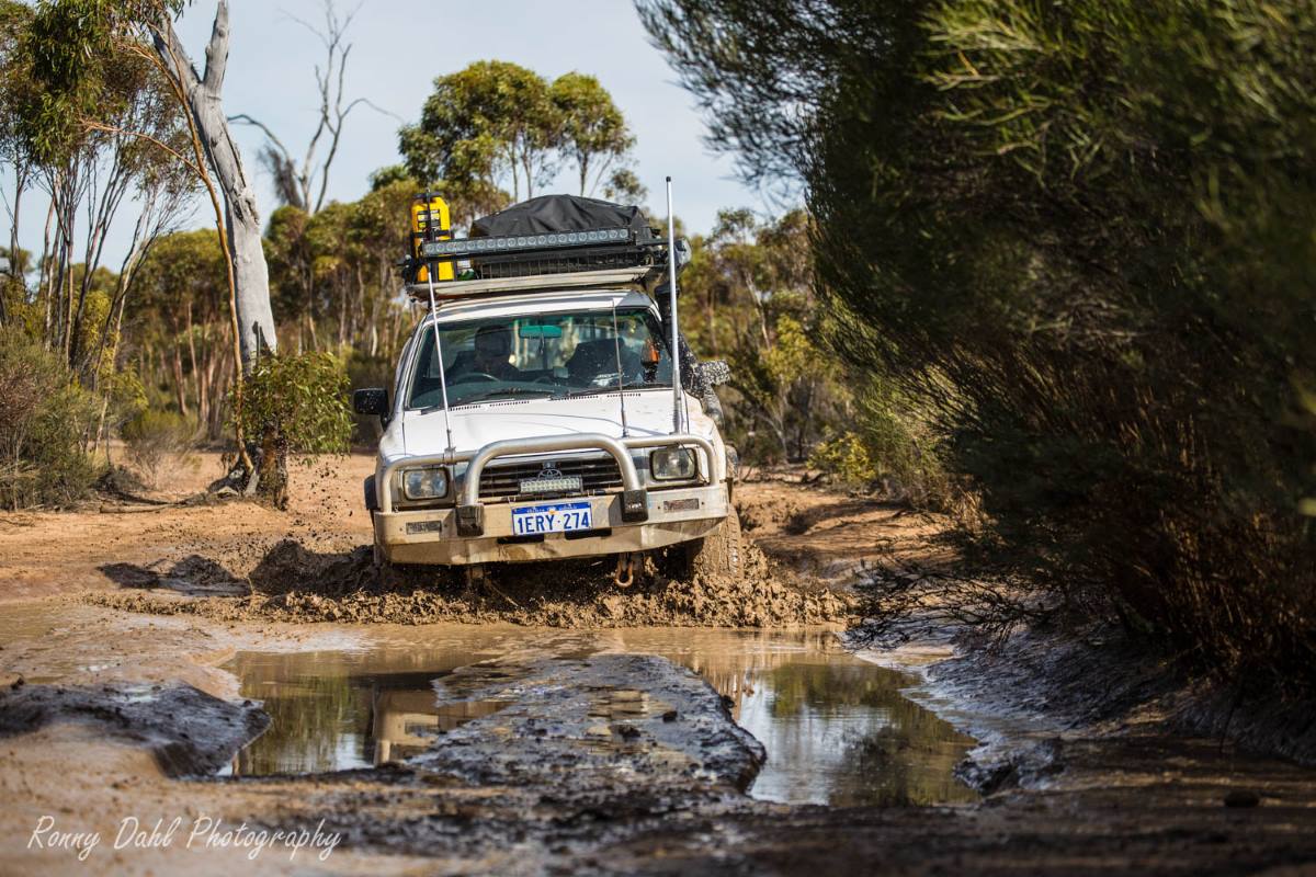 Toyota Hilux in the mud on the Holland Track, Western Australia.