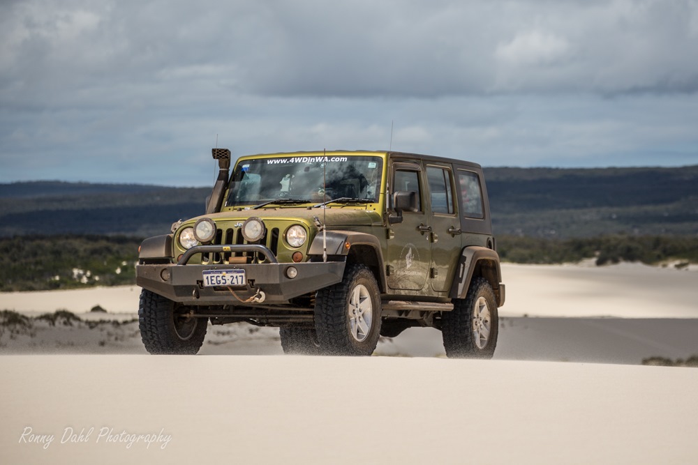 Jeep Wrangler in Yeagerup sand dunes, Western Australia.