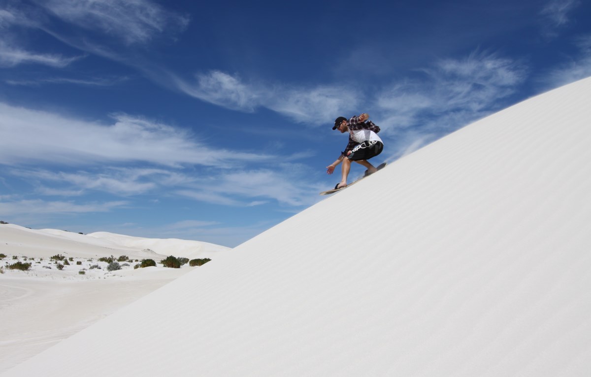 Sand boarding at Lancelin, Western Australia.